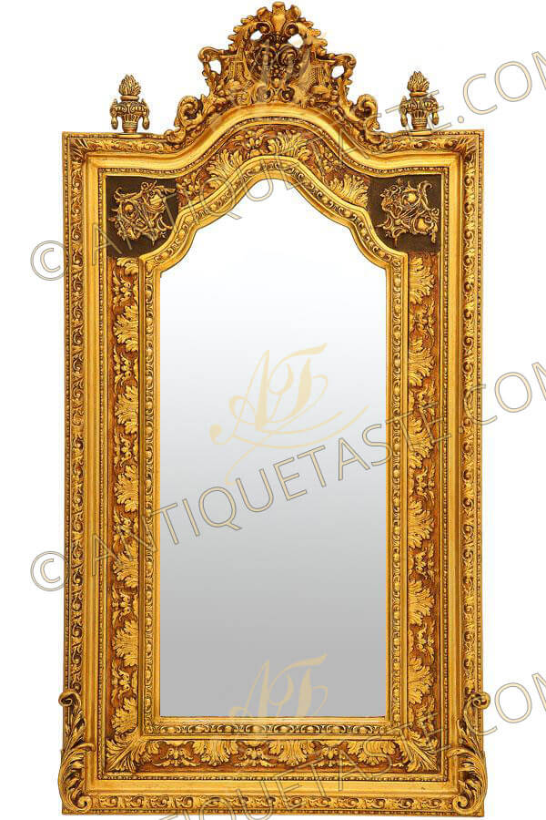 A sensational and richly carved mid 18th century Italian Baroque style pier mirror, gilded with French gold foils 18th carat, The double heavy border is carved and ornamented with gadrooned, egg and dart motifs and beaded row shaped interior borders. The richly carved giltwood border displaying a detailed trailing large acanthus leaves and striking foliate movements and patterns and terminating with S shape scrolled acanthus leaf to each side, The elaborate naturalistic central reserve top with pierced crown issuing C scroll-works and blossoming flowers and pierced leafy works. At each side is an shaped urn of prosperity finial adorned with giltwood bands